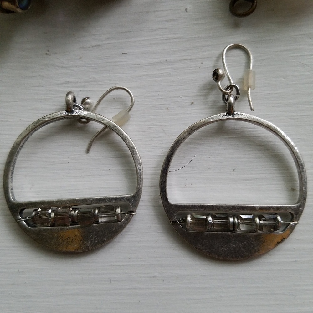 Kenneth Cole Circle dangle earrings with cut out